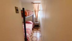 11-3 Depto amoblado y equipado a pasos de la playa Arica!!