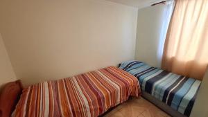 D14-9 Arriendo diario a pasos de la playa Arica