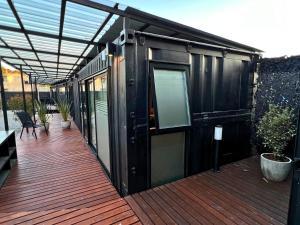 Un contenedor único cerca del mar y la playa