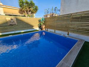 Private Villa with Heated Swimming Pool, Roof Top Solarium & Garden