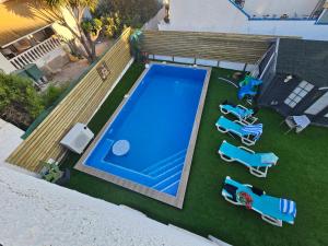 Private Villa with Heated Swimming Pool, Roof Top Solarium & Garden