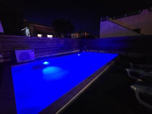 Private Villa with Heated Swimming Pool, Roof Top Solarium & Garden