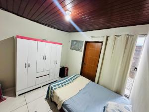 Casa com quarto privativo para cop 30