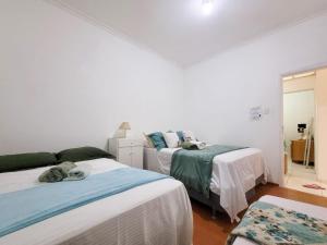 Perfeito para Grupos! 3 Quartos, 2 Banheiros, 5 Min da Praia