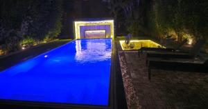 Velora 4 BR Villa With pool and waterfall in New Cairo