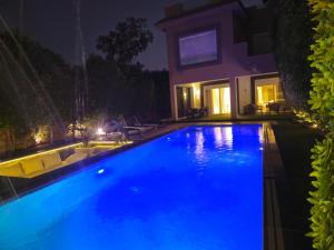 Velora 4 BR Villa With pool and waterfall in New Cairo