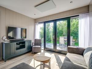 Modern holiday home on Dutch coast with garden