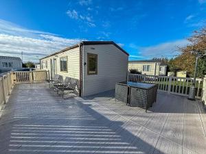 Beautiful 6 Berth Caravan For Hire With Huge Decking At Manor Park Ref 23142K