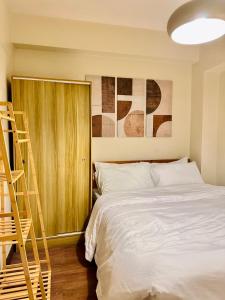 Prisma Residences by Kozy Mood near BGC