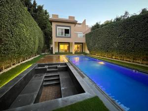 Velora 4 BR Villa With pool and waterfall in New Cairo