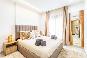 Le COSY CHIC- NEUF - Modern & Chic - Terrasse et Confort - CLIM PARKING et WIFI Gratuit ! GUELIZ