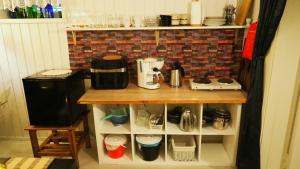 Riverside Bliss - Cozy 1-Bedroom Apartment with Parking & WiFi near Tvedestrand