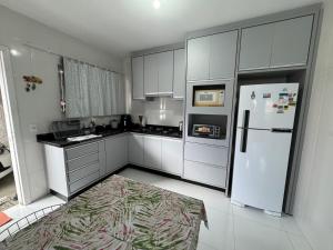 Casa com 2 quartos e 3 camas no Rio vermelho