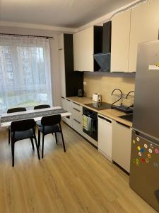 Illumina nowoczesny apartament 50m2, spokojna okolica, 25min do centrum