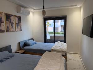 Superbe appartement 120 mc, Plage à pieds, 3 piscines & calme garanti - Sidi Rahal Plage