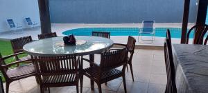 Sobrado na Praia com Piscina em Condomínio