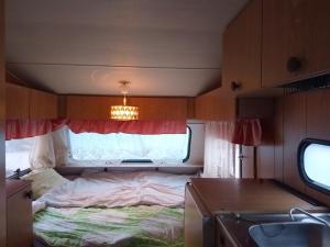 Konkelotie White Caravan