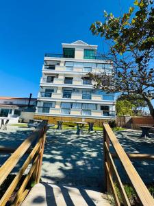 Apartamento pé na areia com vista para o mar