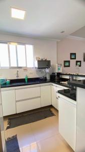 Refúgio Familiar na Enseada Guarujá Condominio Vinä Del Mar AC e Wifi