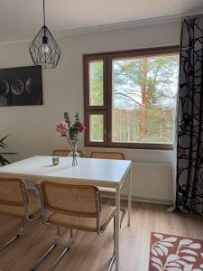 Cozy One-Bedroom Apartment with Sauna and Forest View