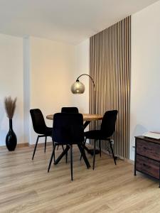 Modernes 2-Zi Apartment mit Terrasse und Garten