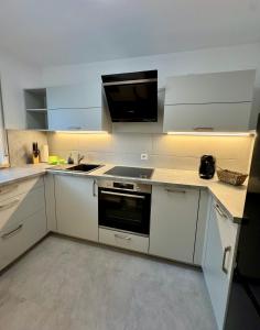 Modernes 2-Zi Apartment mit Terrasse und Garten