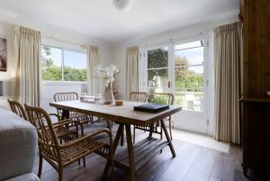 Sunset Sanctuary: Waterfront Home with Balcony and Patio