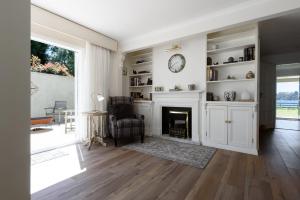 Sunset Sanctuary: Waterfront Home with Balcony and Patio