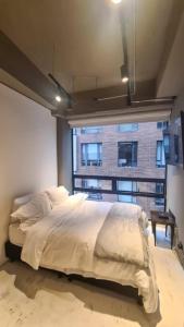 Loft Contemporáneo con Vista Exclusiva con WiFi Cerca del Parque 93