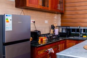 Orchid Homes - Cozy 1BR by Mbezi Beach Africana