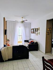 Apto 2 dorm, Vista lateral da praia 200m