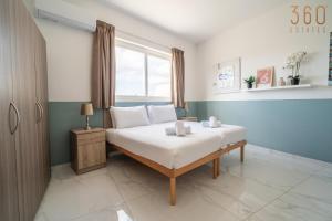 Peaceful 2BR Penthouse with Terrace Views & Beach by360 Estates