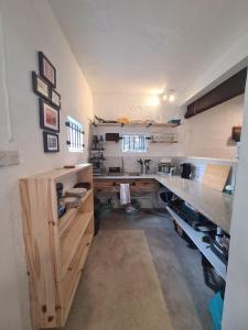 Tipima Guesthouse - Your Cozy Beach Escape