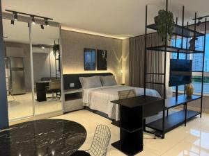 Flat de luxo piscina rooftop e vista para o parque