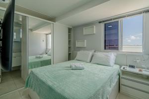 Sofisticado apto pé na areia