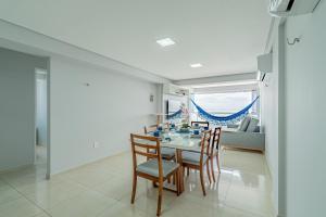 Sofisticado apto pé na areia