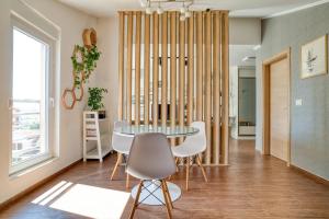 Cozy rooftop apartment with the city view