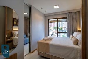 Quarto e sala moderno a 700m do Salvador Shopping