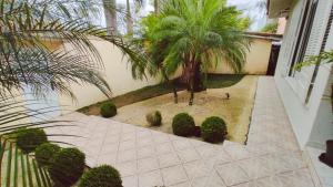 Casa com piscina no Guarujá - Enseada