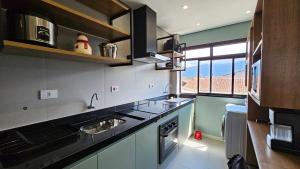 Apartamento com 1 suíte, 1 lavabo, 1 vaga a 70m da Praia