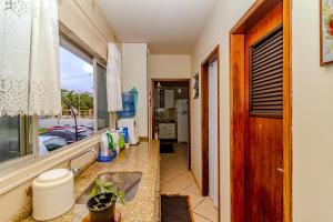 Beira Mar e Frente Lagoa de Barra Velha 4 Quartos