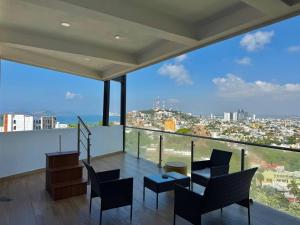 Depa con terraza panoramica al mar y la ciudad