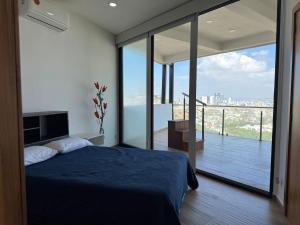 Depa con terraza panoramica al mar y la ciudad