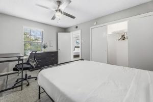Fresh 2BR Escape with Pool and Fitness Amenities