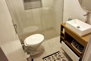 Apartamento na Enseada ambiente familiar e confortável