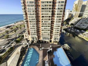 Amplio y cómodo depto para 6 personas con vista al mar y piscina 26