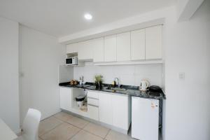 Vera Mujica con Cochera