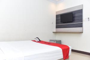 Reddoorz Plus near Makassar Town Square