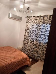 شقة فندقية راقية بالقرب من المتحف المصري الكبير وبالقرب من الأهرامات بكمبوند اشجار سيتي اكتوبر