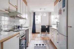 Spacious 2BR City Retreat with Private Sauna